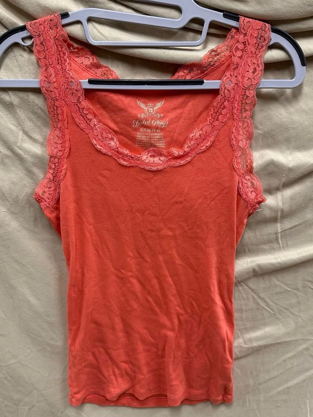 peachy pink long lace tank top.